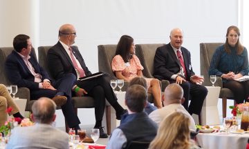John Palmour, second from right, speaks during a panel discussion at the James B. Hunt Jr. Library on NC State's Centennial Campus in October 2022.