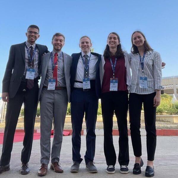 SciBridge students at the 2022 African MRS Conference. Pictured left to right: Saeed Saeed, Nicolas Muecke, Teddy Dano, Rachel Broughton and Allison Ebbert. (Photo credit: Veronica Augustyn)