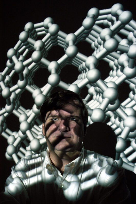 Brenner, photographed in 2006 with an image of a reconstructed diamond surface superimposed. PHOTO BY ROGER WINSTEAD